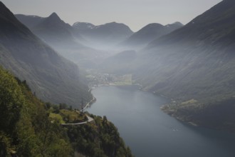 View of Geiranger and Geiranger Fjord from the Ørnevegen Serpentine Road, Geiranger, Møre og
