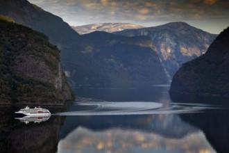 Ferry crosses Aurlandsfjord in morning light, seen from Stegastein, zero