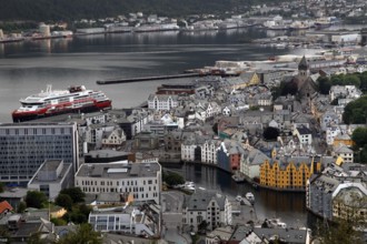 Panoramic view of Ålesund's old town with a Hurtigruten ship in the harbor, Ålesund, Norway