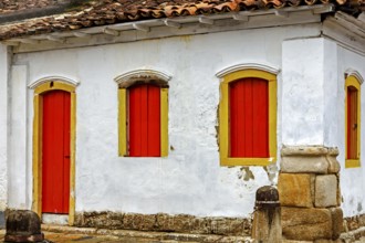 House facade with colorful doors and windows in the historic city of Paraty, Paraty, Rio de