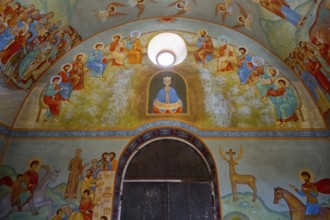 Church interior with detailed wall paintings of saints and biblical scenes, domed church by Kvemo