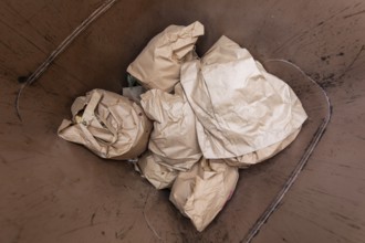 Full brown organic waste bin for food disposal. Germany