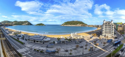 Panoramic view of la concha bay in san sebastian, spain, featuring the sandy beach, city