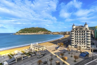 La concha beach bay stretching along the san sebastian cityscape and promenade, with urgull