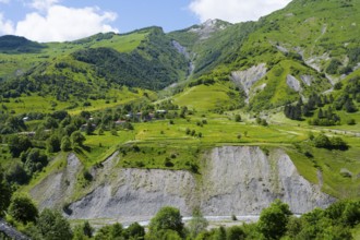 View of deep valleys and green hills in a mountainous and wooded region, landscape between Kvesheti