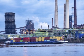 Shipping traffic on the Rhine near Duisburg-Bruckhausen, industrial setting of the ThyssenKrupp