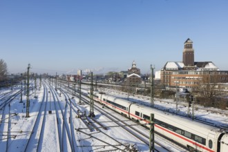 An ICE runs on the railway line next to the BEHALA (Berliner Hafen- und Lagerhausgesellschaft) on