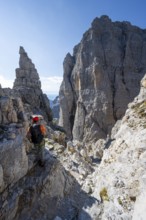 Climbers on the Via Ferrata Bocciere Centrale via ferrata, spectacular mountain landscape with