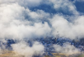 View of a sea of fog from Vormauerstein, Sankt Wolfgang am Wolfgangsee, church tower rising out of