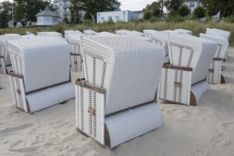 Beach chairs set up for transport to winter quarters, sandy beach, Baltic Sea, Binz, seaside