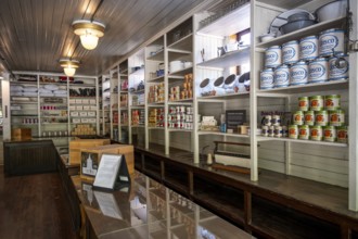 Interior view, historic restored Kennicott shopping store with historic goods display, retro food