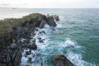 Sunset with wide view over the east coast at Cape Byron, New South Wales, Australia