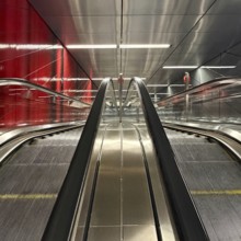 Artwork titled Three Model Spaces by Ralf Brög, escalators at Heinrich-Heine-Allee subway station,