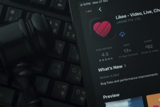 Dhaka, Bangladesh- 28 Oct 2025: An iPad displaying the Likee app against a judge's gavel and dark