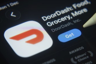 Dhaka, Bangladesh- 01 Dec 2025: A close-up of the DoorDash app icon in the App Store on an iPad