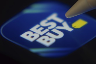 Dhaka, Bangladesh- 06 Dec 2025: Close-up of the Best Buy app on a screen with a stylus pointing at