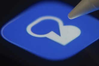 Dhaka, Bangladesh- 06 Dec 2025: Close-up of the Beeper app on a screen with a stylus pointing at it