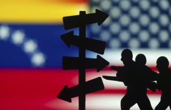 Geopolitical Conflict and Migration Concept with USA and Venezuela Flags