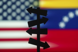 Crossroads of Diplomacy: USA and Venezuela Flag Background with Signpost