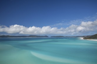 Sunny daytime view from Hill Inlet lookout over Whitehaven Beach, Whitsunday Island, Queensland,