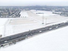 The fields in the north-west of Frankfurt am Main covered in snow. (Aerial view with a drone) On