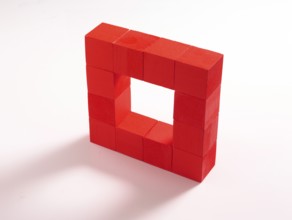 12 red wooden cubes against a white background