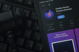 Dhaka, Bangladesh- 28 Oct 2025: An iPad displaying the Firefox Focus app against a judge's gavel