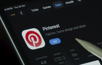 Dhaka, Bangladesh- 30 Oct 2025: Pinterest app displayed on a iPad screen in dark mode with a