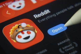 Dhaka, Bangladesh- 01 Dec 2025: A close-up of the Reddit app icon in the App Store on an iPad