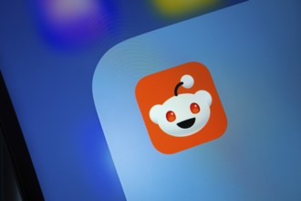 Dhaka, Bangladesh- 02 May 2025: Reddit app icon is seen on smartphone