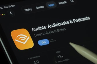 Dhaka, Bangladesh- 30 Oct 2025: Audible app displayed on a iPad screen in dark mode with a digital