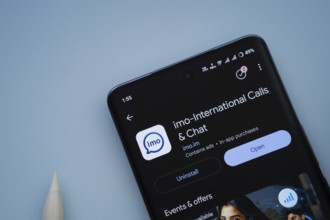 Dhaka, Bangladesh- 29 May 2025: On a blue surface, a smartphone displays the imo app within the