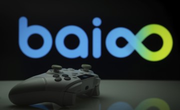 Dhaka, Bangladesh- 20 Mar 2025: A close-up of a white gamepad with the Baioo Family Interactive Ltd