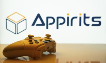 Dhaka, Bangladesh- 20 Mar 2025: A close-up of a white gamepad with the Appirits seen on screen in