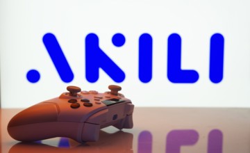 Dhaka, Bangladesh- 20 Mar 2025: A close-up of a white gamepad with the Akili Interactive seen on