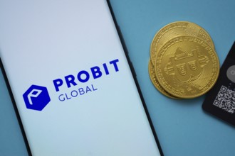 Dhaka, Bangladesh- 26 Aug 2025: Smartphone displaying ProBit Global logo surrounded by Bitcoin