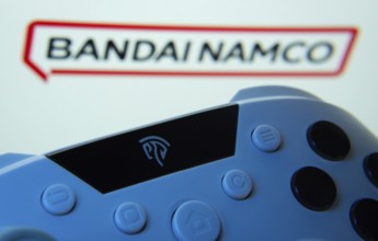 Dhaka, Bangladesh- 24 Mar 2025: A close-up of a gamepad with the Bandai Namco Entertainment seen on