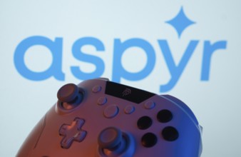 Dhaka, Bangladesh- 20 Mar 2025: A close-up of a gamepad with the Aspyr seen on screen in the