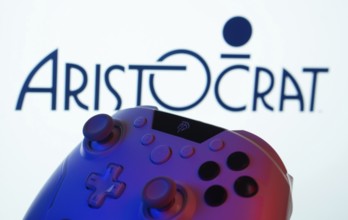 Dhaka, Bangladesh- 20 Mar 2025: A close-up of a gamepad with the Aristocrat seen on screen in the