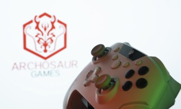 Dhaka, Bangladesh- 20 Mar 2025: A close-up of a gamepad with the ARCHOSAUR GAMES seen on screen in
