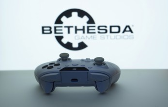 Dhaka, Bangladesh- 08 Apr 2025: A gaming controller in front of a Bethesda Game Studios screen