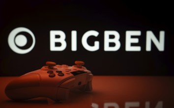 Dhaka, Bangladesh- 20 Mar 2025: A close-up of a white gamepad with the Bigben Interactive seen on