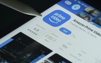 Dhaka, Bangladesh- 30 Oct 2025: Amazon Prime Video app on a iPad screen with a pen pointing at the