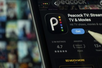 Dhaka, Bangladesh- 24 Oct 2025: A iPad screen displaying the Peacock TV app on App store