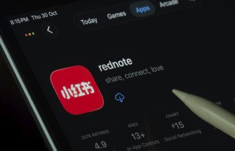 Dhaka, Bangladesh- 30 Oct 2025: rednote app displayed on a iPad screen in dark mode with a digital