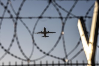 Symbolic picture security at the airport, outer fence at Düsseldorf International Airport, steel