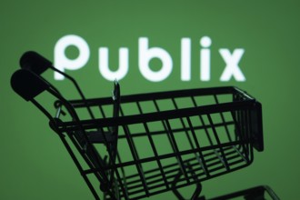 Dhaka, Bangladesh- 03 July 2025: Silhouette of a shopping cart in front of the Publix logo,