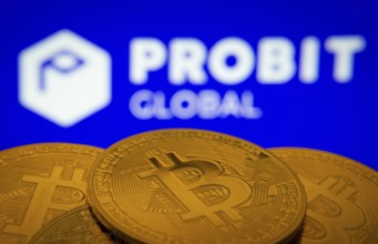 Dhaka, Bangladesh- 27 Mar 2025: Close-up of Bitcoin coins with the ProBit Global logo visible on a