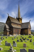 Lom Stave Church (Lom stavkyrkje) with cemetery in the foreground, Lom, Norway