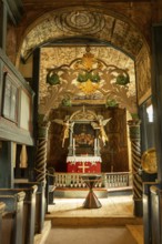 Interior with a view of the altar in Lom Stave Church (Lom stavkyrkje), Lom, Norway